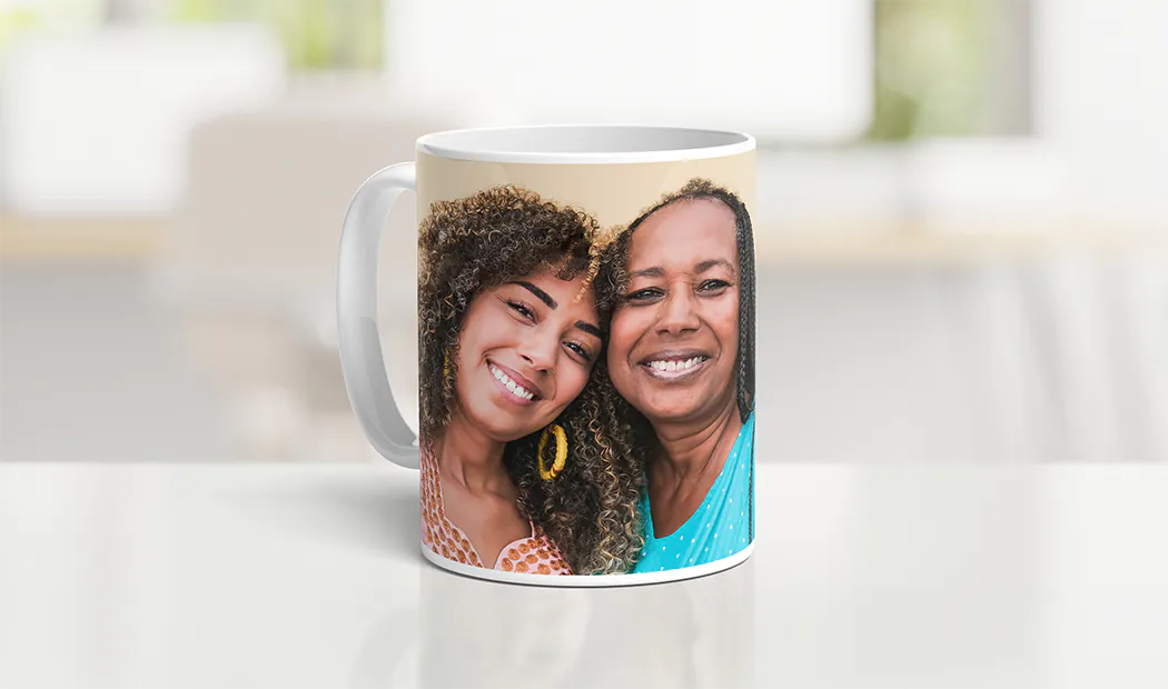 Personalised Photo Mugs by Printerpix|Mum and baby holding Printerpix cartoon design custom mug with dad text|Personalised photo mug with picture of baby crawling wearing animal overall|Mum and daughter holding custom designed photo mugs with family photos|Kissing couple with personalised mugs with text on|Personalised photo mug with your own photo of a dog on|||||